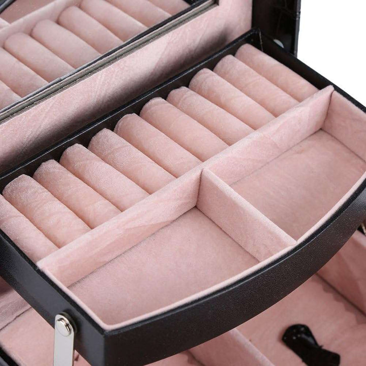 3-Layer Leather Jewelry Box Black interior with divided compartments for organizing rings, earrings, and bracelets.