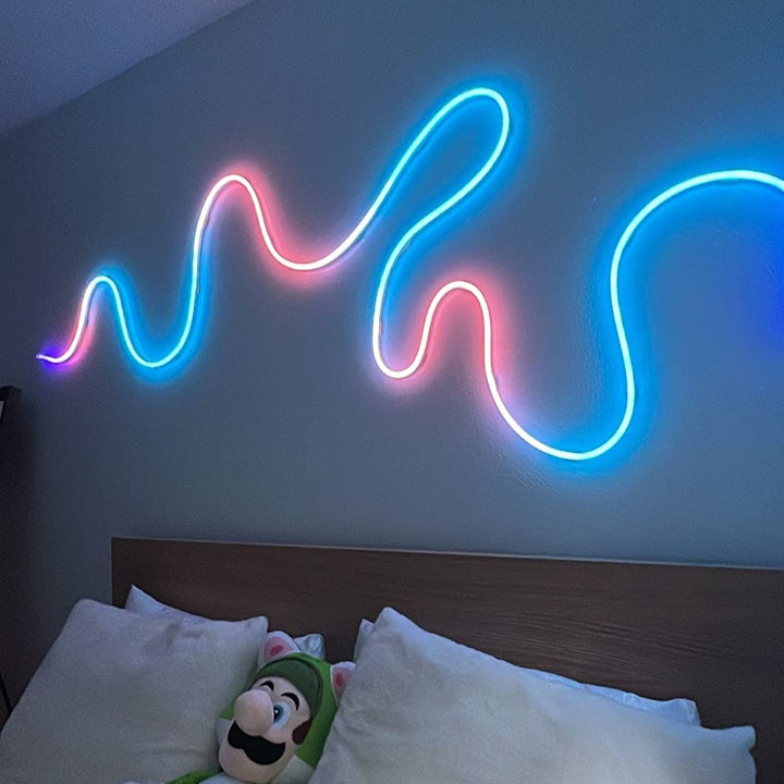 Multicolor LED Rope Light above bed, creating a vibrant, customizable glow with dynamic color options, perfect for adding ambiance to any bedroom or space.