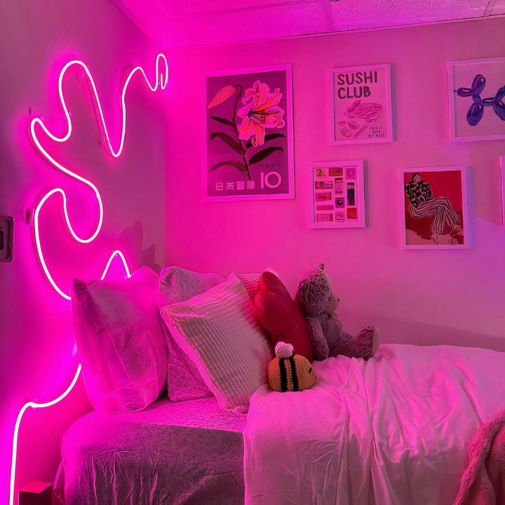 Multicolor LED Rope Light, Alexa compatible, in a dorm room with soft pink lighting, enhancing the space with a cozy and dynamic atmosphere, perfect for personalization and ambiance.
