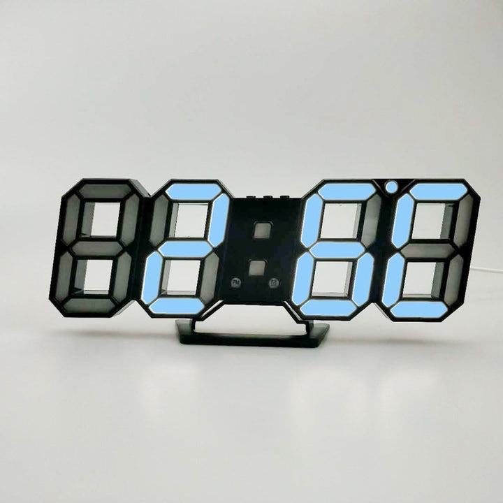 VibeCore 3D LED Digital Alarm Clock in black with blue light, featuring bold, illuminated 3D LED digits for easy time visibility. This modern alarm clock offers additional features like a thermometer, perpetual calendar, and moon phase display. Its sleek black design with blue light adds a stylish, contemporary touch, making it a perfect functional and aesthetic addition to any room.