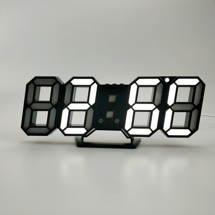 VibeCore 3D LED Digital Alarm Clock in black with white light, front view. Featuring bold, illuminated 3D LED digits for clear time display, this modern alarm clock also includes a thermometer, perpetual calendar, and moon phase display. Its sleek black design adds a contemporary touch, making it a stylish and functional addition to any room.