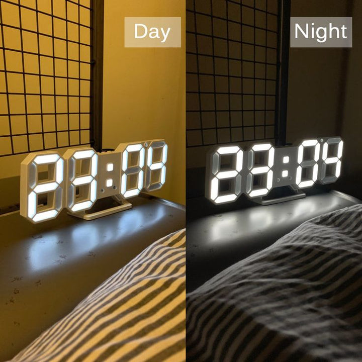 VibeCore 3D LED Digital Alarm Clock in white with white light, showing day vs night comparison. Featuring bold, illuminated 3D LED digits for clear time visibility, this modern alarm clock offers additional features like a thermometer, perpetual calendar, and moon phase display. Its sleek white design with white light adds a stylish, contemporary touch, providing both functionality and aesthetic appeal for any room, day or night.