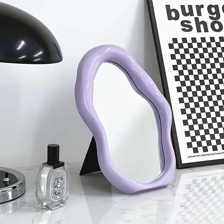VibeCore Abstract Blob Makeup Mirror in Lilac, featuring a soft pastel hue and a modern, artistic shape that elevates any vanity or decor setup.