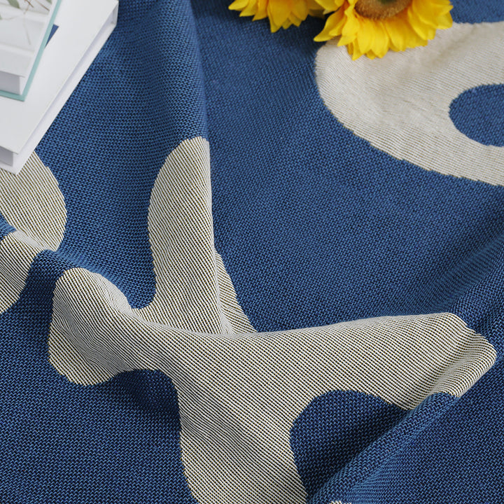 Close-Up of Abstract Blue Coral Woven Blanket Pattern – Textured Cotton Weave, Reversible Bohemian Design, Modern Geometric Artistry