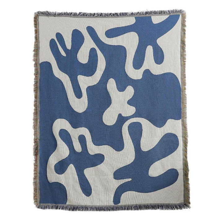 VibeCore Abstract Blue Coral Woven Blanket product view, highlighting its unique coral-inspired abstract design. Crafted from 100% combed cotton, this blanket combines comfort and artful style, perfect for adding a creative touch to your space. Its reversible patterns provide easy style versatility, making it a must-have for any room.