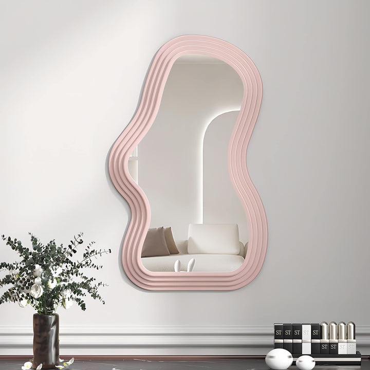 VibeCore Abstract Curve Wall Mirror Light Pink Curve: A chic light pink mirror with a smooth, curved design that enhances your space with a modern and artistic touch, perfect for creating a soft, welcoming atmosphere in any room.