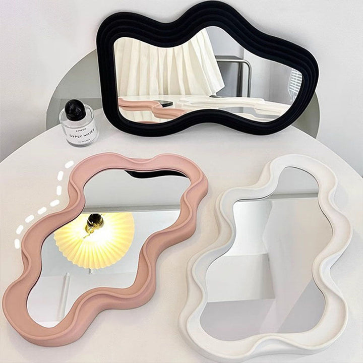 VibeCore Abstract Curve Wall Mirror Light Pink and White Ripple with Black Curve: A stylish abstract wall mirror featuring a light pink and white ripple design paired with a sleek black curve, creating a bold, modern aesthetic for any room.