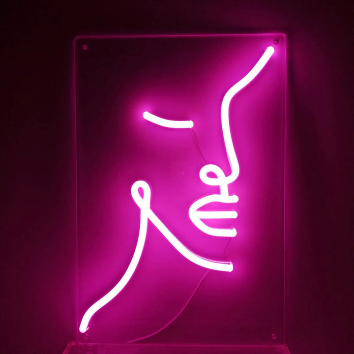 VibeCore Abstract Face Neon Light Against Wall