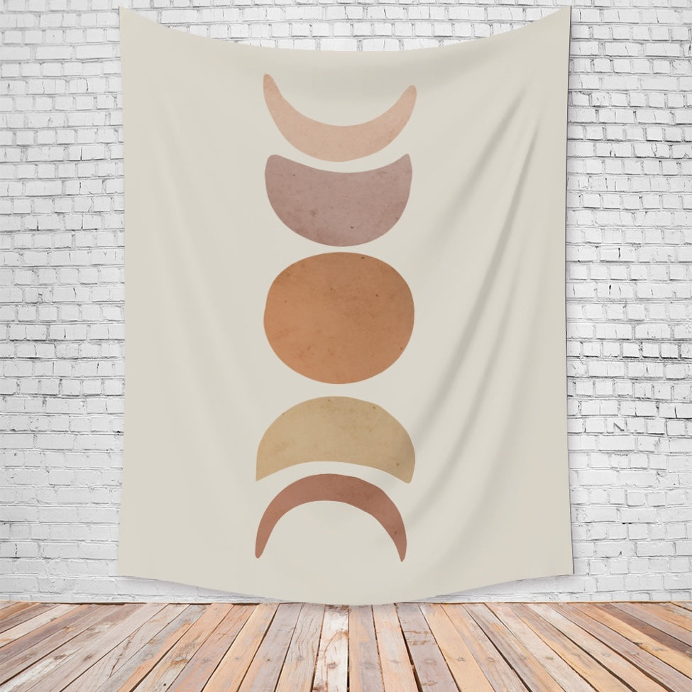 VibeCore Abstract Phases of the Moon Tapestry Hanging On Brick Wall