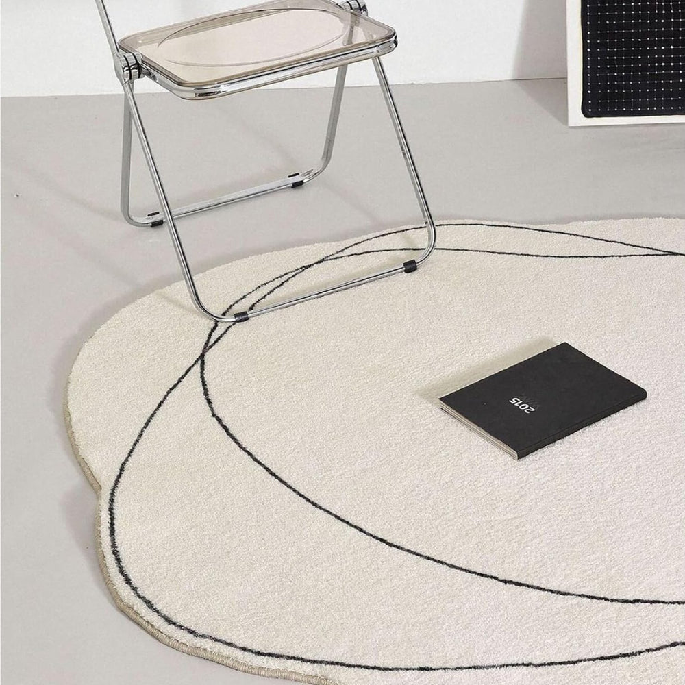 Close-up of the VibeCore Abstract Squiggle Area Rug, highlighting its playful squiggle design. The rug's ultra-soft imitation cashmere texture and bold, freeform pattern bring a modern, artistic touch to the space.