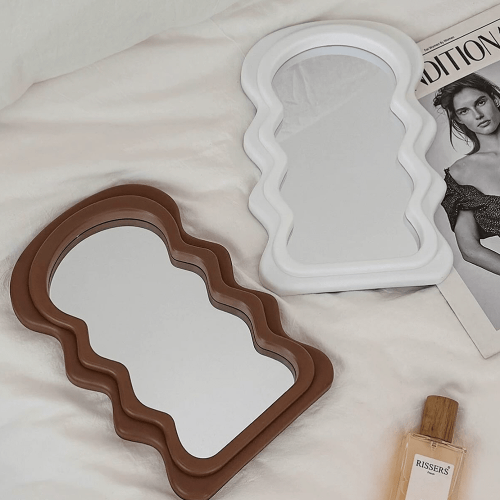 Aesthetic abstract wave makeup mirror in brown and white featuring a sleek wavy design and high-clearness silver mirror perfect for modern vanity setups home decor and portable styling