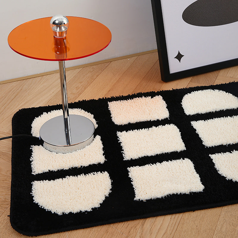 Close-up of the VibeCore Aesthetic Abstract Rug, highlighting its clean lines and geometric black and white design. The soft, plush texture is visible, adding a modern, minimalist touch to the space.