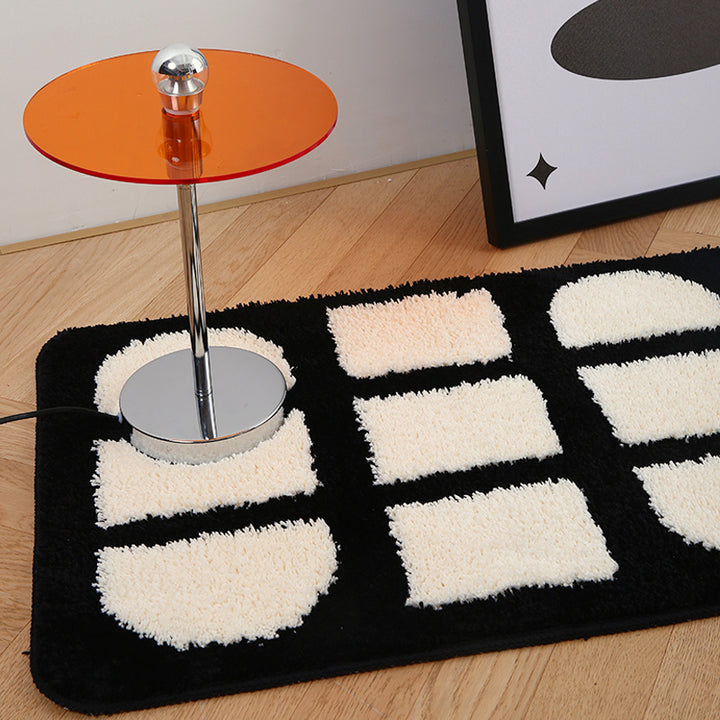 Close-up of the VibeCore Aesthetic Abstract Rug, highlighting its clean lines and geometric black and white design. The soft, plush texture is visible, adding a modern, minimalist touch to the space.