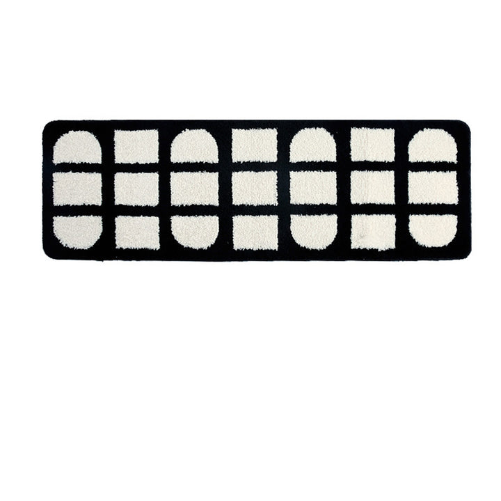 Full product view of the VibeCore Aesthetic Abstract Rug, showcasing its modern black and white geometric design. The rectangular rug adds a contemporary minimalist touch to any space, highlighting its soft, plush texture and anti-slip backing for safety.