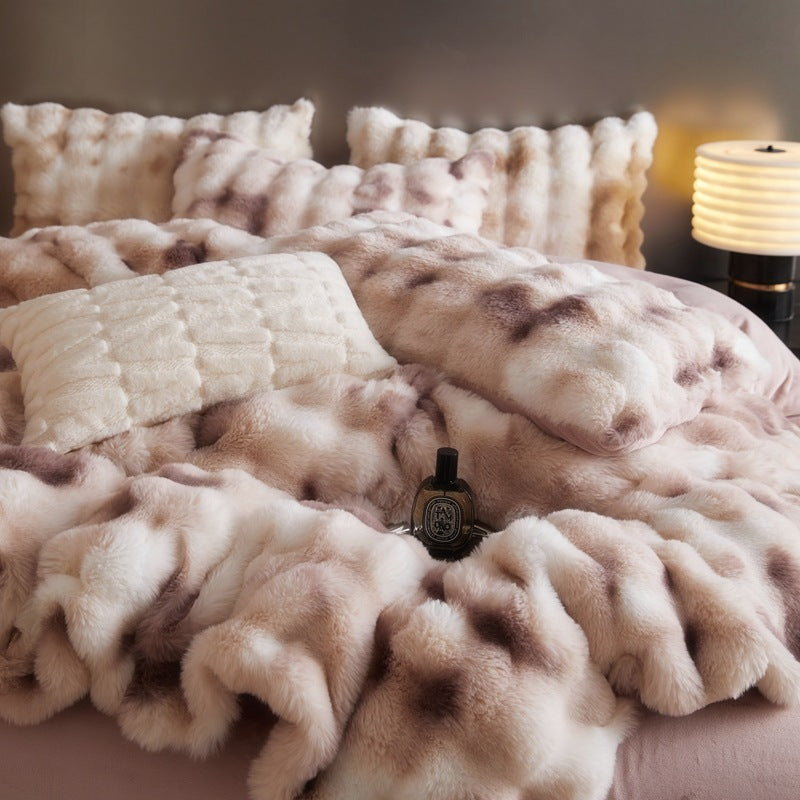 Front close-up photo of the 'Arctic Faux Fur Bedding Set' in cinnamon, showcasing its luxurious, soft faux fur texture. The rich, warm brown and beige color and plush fabric add a cozy, elegant touch to any bedroom, perfect for creating a stylish and inviting space.
