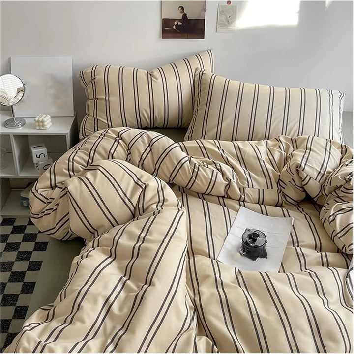 Aerial close-up of the VibeCore Aesthetic Beige Urban Stripe Duvet Cover Set, showcasing its sleek, modern stripe pattern in warm beige tones. Crafted from soft, breathable fabric, this duvet set adds a stylish, cozy touch to any bedroom or dorm.
