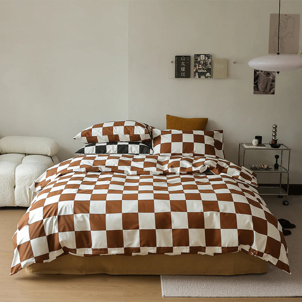 Aerial view of the VibeCore Aesthetic Checkered Duvet Cover Set in brown, showcasing its bold checkered design made from 100% ultra-soft cotton. Perfect for a modern, minimalist bedroom or dorm setup, offering cozy, breathable comfort with effortless style.