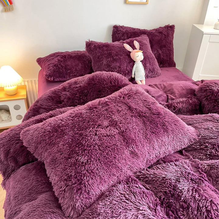 Close-up of the pillow cover and duvet from the VibeCore Cloud 9 Bedding Set in the color Purple, showcasing ultra-soft fleece fabric for exceptional comfort. This cozy, luxurious bedding set adds warmth and style to your bedroom or dorm, perfect for staying warm, relaxing, or enhancing your space.