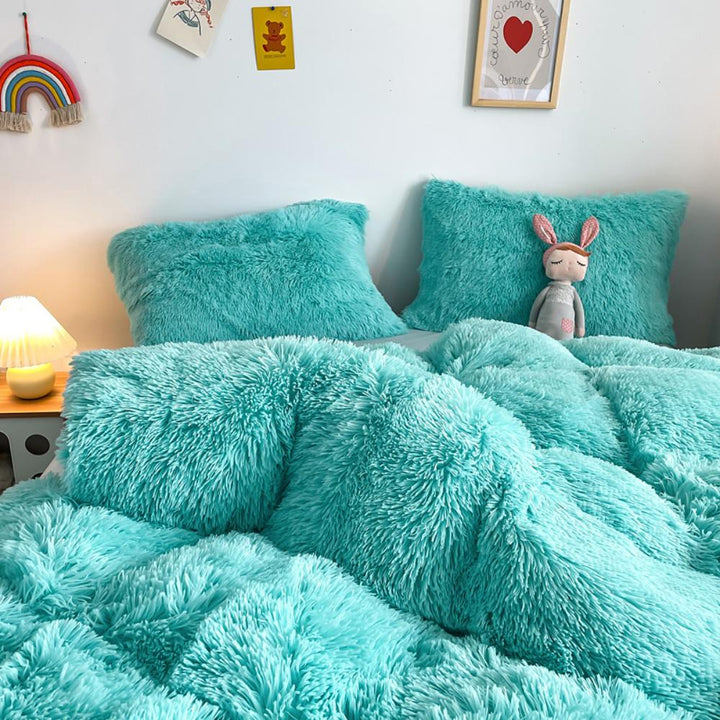 Ultra close-up of the plush material of the VibeCore Cloud 9 Plush Bedding Set in the colour Aqua, showcasing its ultra-soft fleece fabric for superior comfort and cozy warmth. Perfect for creating a luxurious, comfortable sleep environment and adding stylish elegance to your bedroom or dorm.