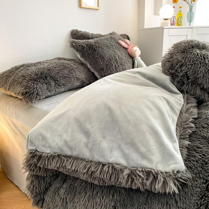Close-up of the duvet cover from the VibeCore Cloud 9 Bedding Set in the color Dark Gray, featuring ultra-soft fleece fabric for ultimate comfort and cozy luxury. Perfect for adding warmth, style, and a plush feel to your bedroom or dorm, ideal for sleeping or relaxing.
