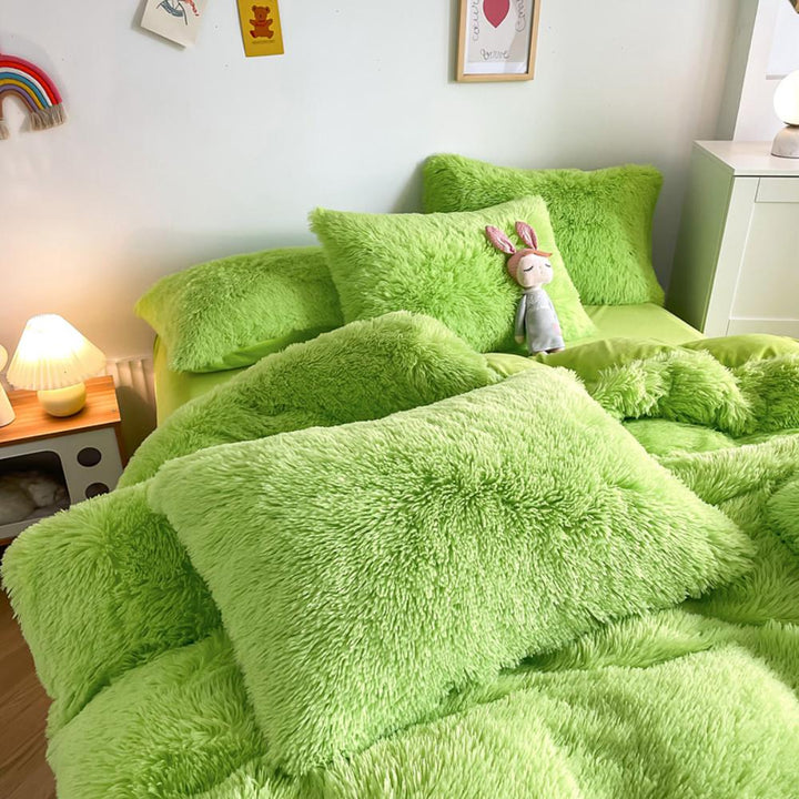 Close-up of the pillow cover and duvet from the VibeCore Cloud 9 Bedding Set in the color Green, showcasing ultra-soft fleece fabric for exceptional comfort. This cozy, luxurious bedding set adds warmth and style to your bedroom or dorm, perfect for staying warm, relaxing, or enhancing your space.