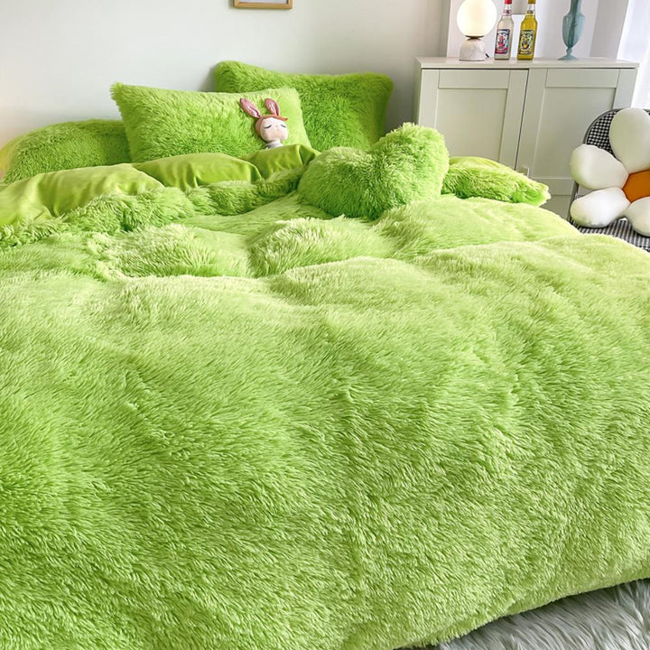 Ultra close-up of the plush material of the VibeCore Cloud 9 Plush Bedding Set in the colour Green, showcasing its ultra-soft fleece fabric for superior comfort and cozy warmth. Perfect for creating a luxurious, comfortable sleep environment and adding stylish elegance to your bedroom or dorm.