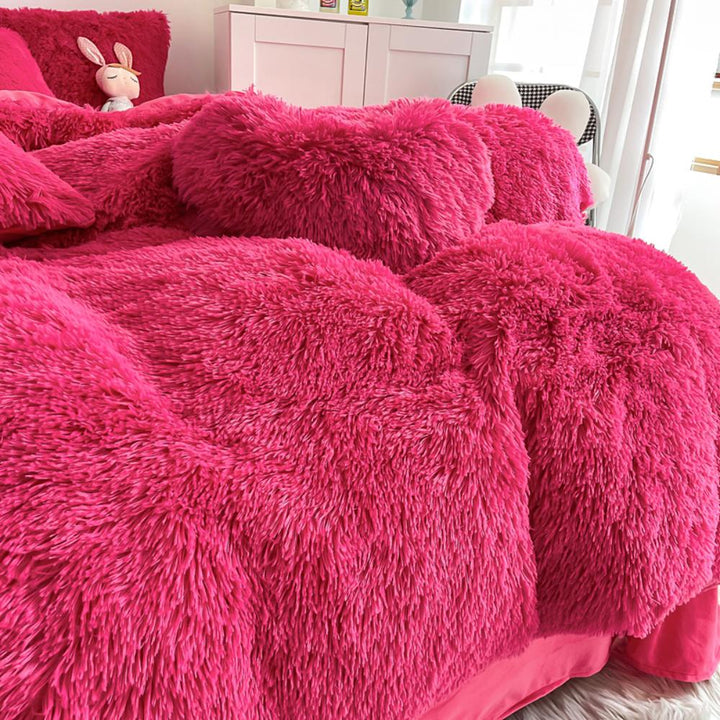 Ultra close-up of the plush material of the VibeCore Cloud 9 Plush Bedding Set in the colour Rose Red, showcasing its ultra-soft fleece fabric for superior comfort and cozy warmth. Perfect for creating a luxurious, comfortable sleep environment and adding stylish elegance to your bedroom or dorm.