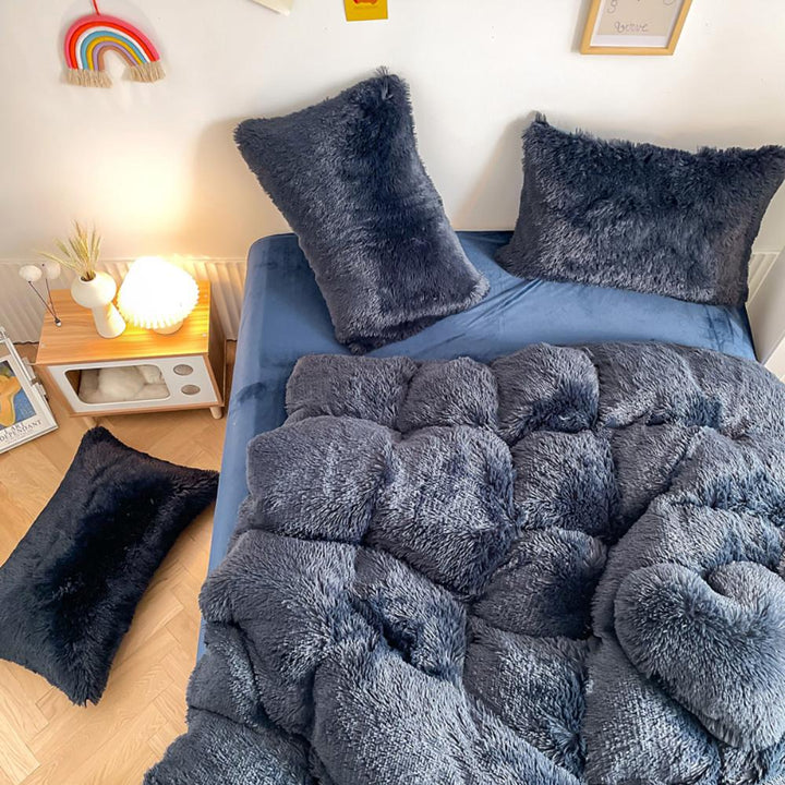 Alternative aerial view of the plush material of the VibeCore Cloud 9 Plush Bedding Set in the colour Navy Blue, showcasing its ultra-soft fleece fabric for superior comfort and cozy warmth. Perfect for creating a luxurious, comfortable sleep environment and adding stylish elegance to your bedroom or dorm.
