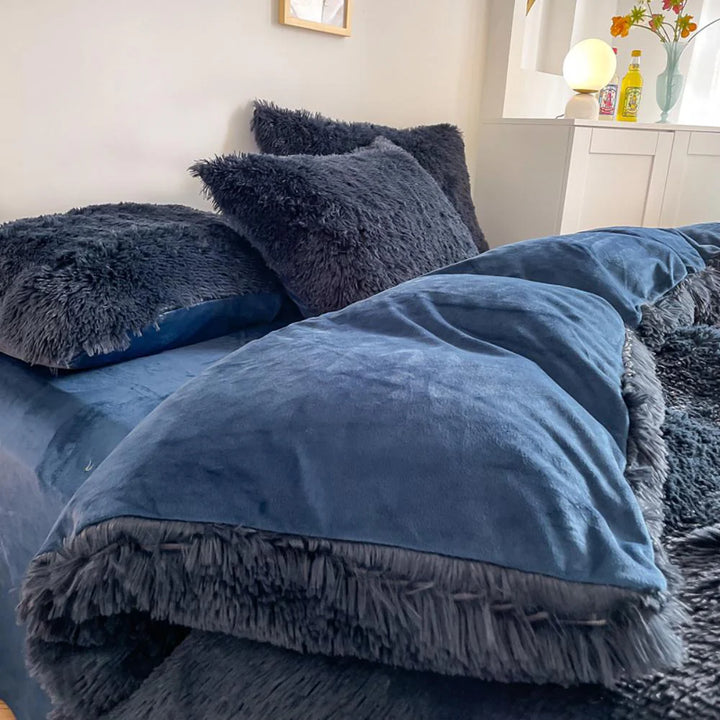 Close-up of the duvet cover from the VibeCore Cloud 9 Bedding Set in the color Navy Blue, featuring ultra-soft fleece fabric for ultimate comfort and cozy luxury. Perfect for adding warmth, style, and a plush feel to your bedroom or dorm, ideal for sleeping or relaxing.