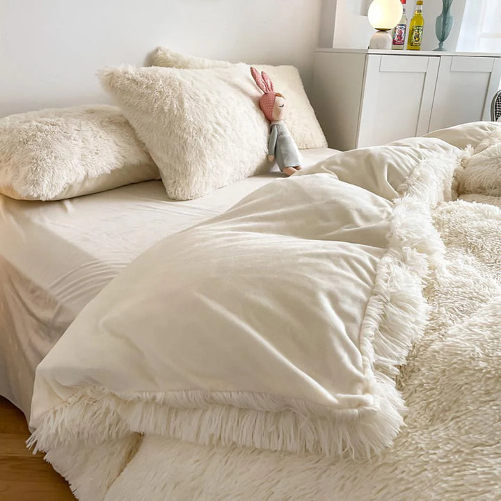 Close-up of the duvet cover from the VibeCore Cloud 9 Bedding Set in the color White, featuring ultra-soft fleece fabric for ultimate comfort and cozy luxury. Perfect for adding warmth, style, and a plush feel to your bedroom or dorm, ideal for sleeping or relaxing.