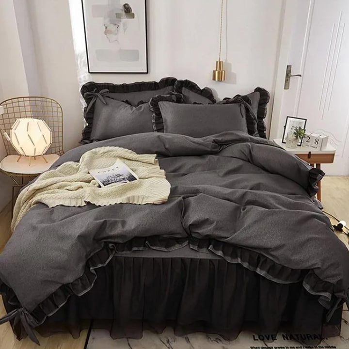 Aerial view of the 'Coquette Goddess Bedding Set' in the color Black, featuring luxurious textures and soft, elegant fabric. The bedding exudes feminine and coquette charm and sophistication, perfect for creating a cozy and stylish bedroom or dorm retreat.