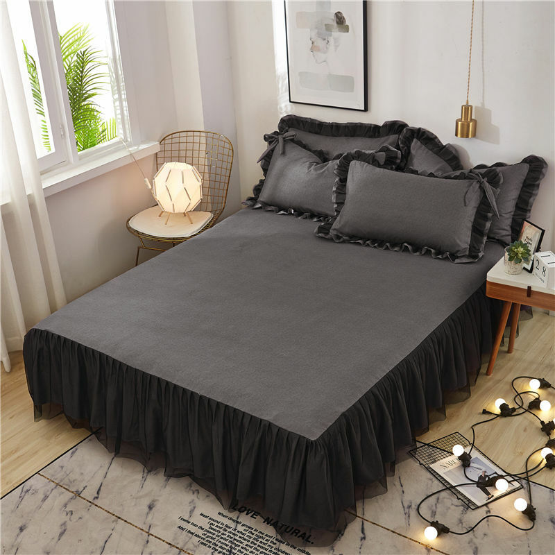 Aerial view of the bed sheet from the 'Coquette Goddess Bedding Set' in black, highlighting its smooth, high-quality fabric and sleek, luxurious finish. Perfect for a bold and sophisticated bedroom look.