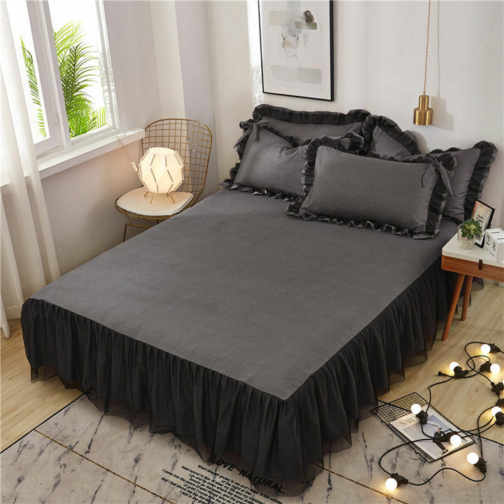 Aerial view of the bed sheet from the 'Coquette Goddess Bedding Set' in black, highlighting its smooth, high-quality fabric and sleek, luxurious finish. Perfect for a bold and sophisticated bedroom look.