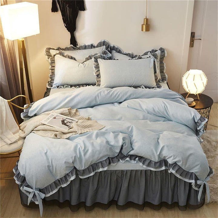 Aerial view of the 'Coquette Goddess Bedding Set' in the color Blue Gray, featuring luxurious textures and soft, elegant fabric. The bedding exudes feminine and coquette charm and sophistication, perfect for creating a cozy and stylish bedroom or dorm retreat.