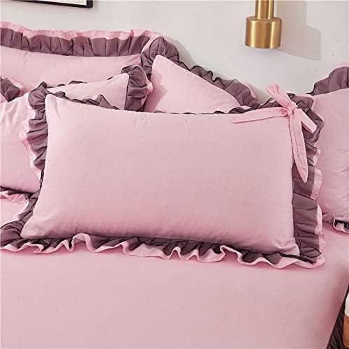 Close-up of the pillow cover from the 'Coquette Goddess Bedding Set' in the color Light Pink, showcasing its intricate detailing, soft fabric,  elegant ruffles, and cute bow-ties. Perfect for adding a touch of coquette luxury and comfort to your bedroom or dorm.