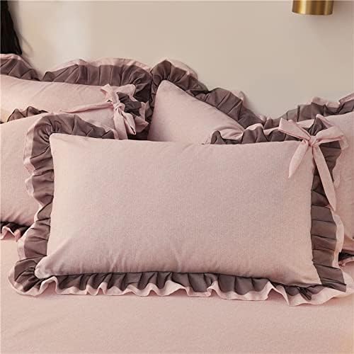 Close-up of the pillow cover from the 'Coquette Goddess Bedding Set' in the color mauve, showcasing its intricate detailing, soft fabric,  elegant ruffles, and cute bow-ties. Perfect for adding a touch of coquette luxury and comfort to your bedroom or dorm.