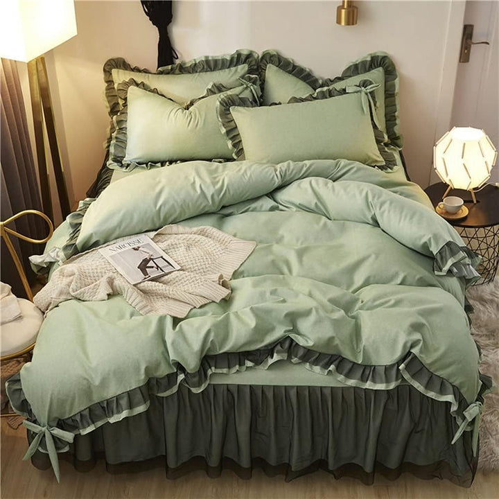 Aerial view of the 'Coquette Goddess Bedding Set' in the color Sage, featuring luxurious textures and soft, elegant fabric. The bedding exudes feminine and coquette charm and sophistication, perfect for creating a cozy and stylish bedroom or dorm retreat.
