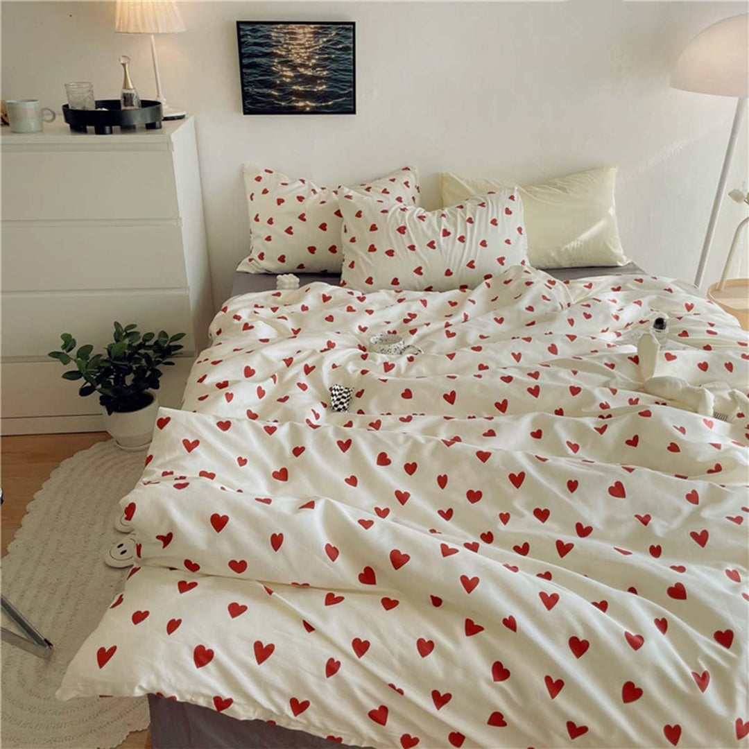 Aerial top view of the VibeCore Crimson Love Bedding Set, featuring the soft cotton-polyester blend fabric and vibrant crimson heart pattern, creating a bold and cozy focal point for any bedroom or dorm.
