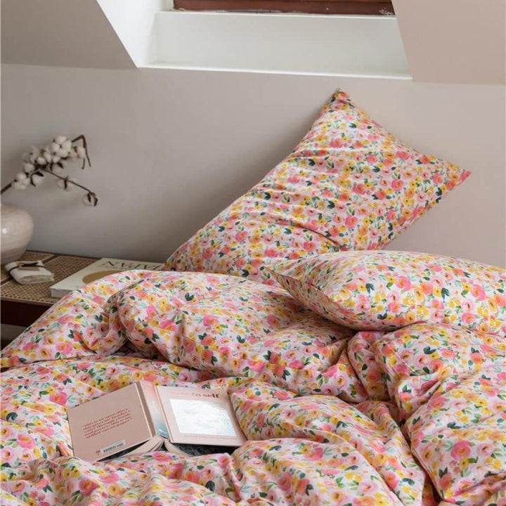 Close-up of the VibeCore Aesthetic Daydream Garden Duvet Cover Pillowcases, showcasing a soft, breathable cotton fabric with a charming garden floral pattern, designed to complement the serene and whimsical atmosphere of your bedroom or dorm.