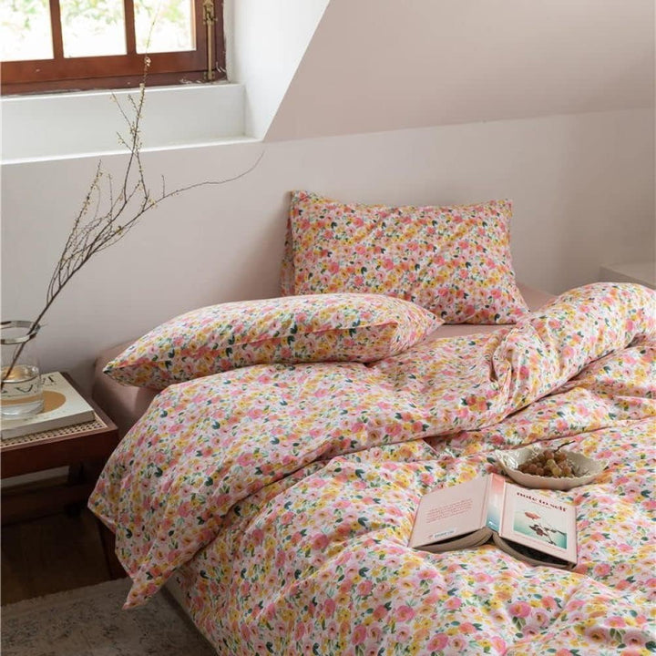 Side aerial view of the VibeCore Aesthetic Daydream Garden Duvet Cover, showcasing a dreamy garden-inspired floral pattern on soft, breathable cotton, adding a serene and whimsical touch to your bedroom or room decor.