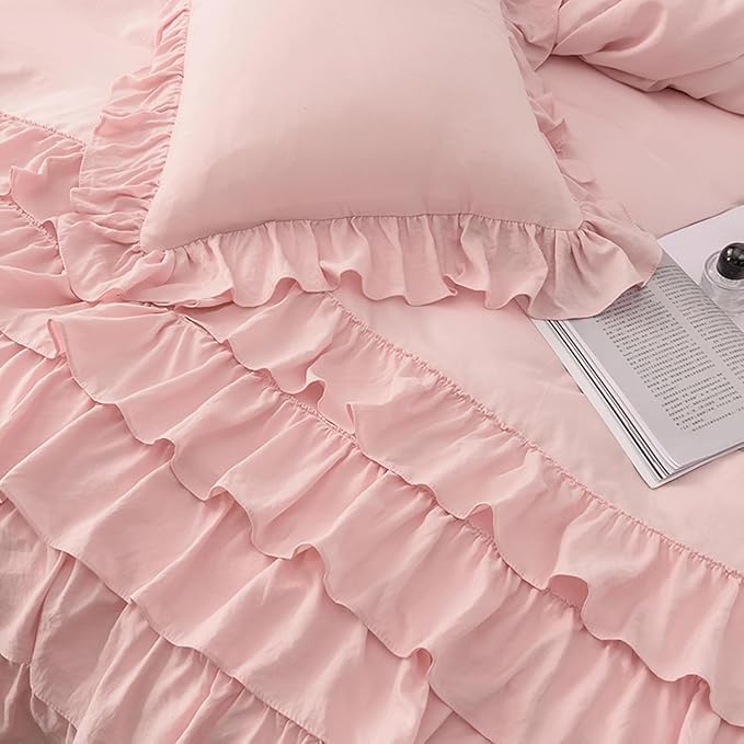 Close-up view of the VibeCore Aesthetic Elegant Ruffles Duvet Cover Set in baby pink, highlighting the soft ruffle details and the smooth, breathable fabric. The perfect blend of cozy comfort and chic, modern style for any bedroom or dorm.