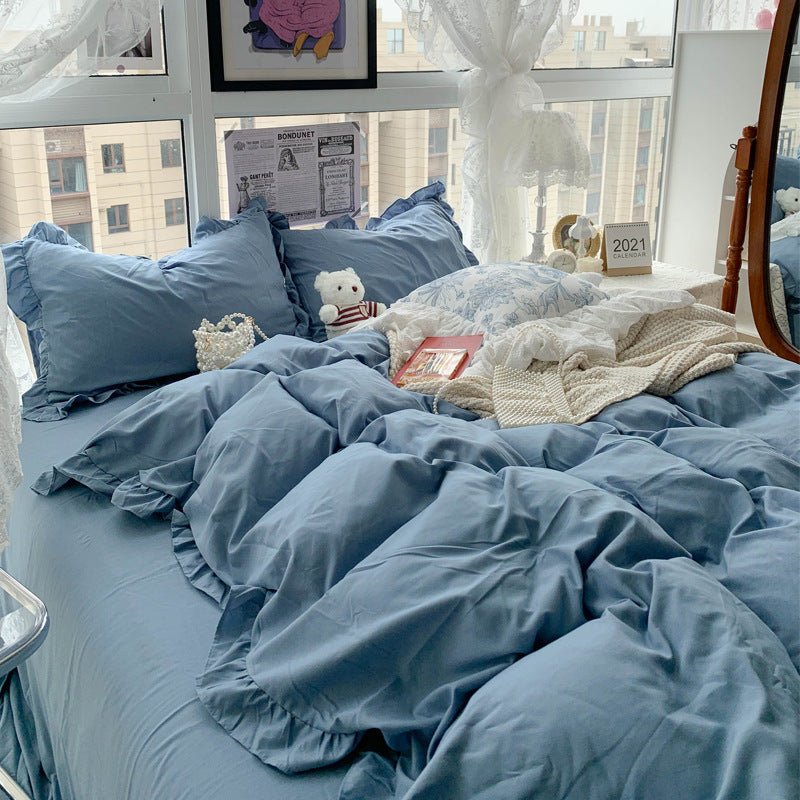 Aerial view of the VibeCore French Ruffles Bedding Set in soft blue, featuring elegant, flowy ruffles and ultra-soft fabric for a chic, sophisticated look.