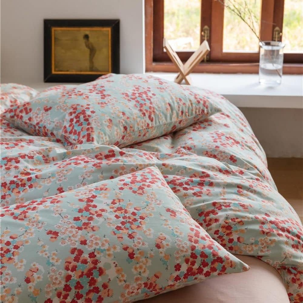 Close-up view of the VibeCore Aesthetic Japanese Blossom Duvet Cover pillowcase, showcasing its delicate floral design and soft, breathable fabric, perfect for enhancing your cozy, nature-inspired bedroom or dorm aesthetic.