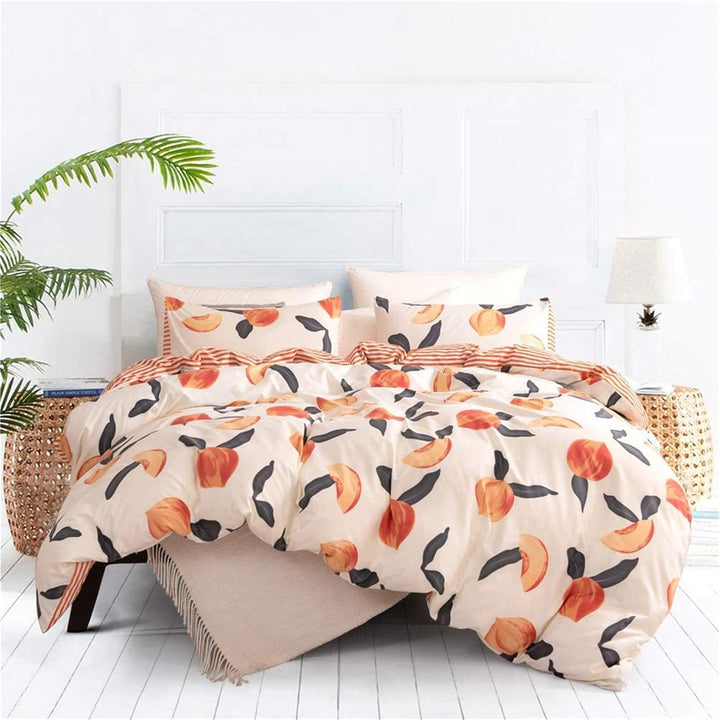 Aerial view of the VibeCore Aesthetic Just Peachy Watercolor Duvet Cover Set, featuring soft watercolor peach tones in a flowing, delicate pattern. The cotton-polyester blend offers year-round comfort while creating a warm, inviting atmosphere in any bedroom or dorm room.