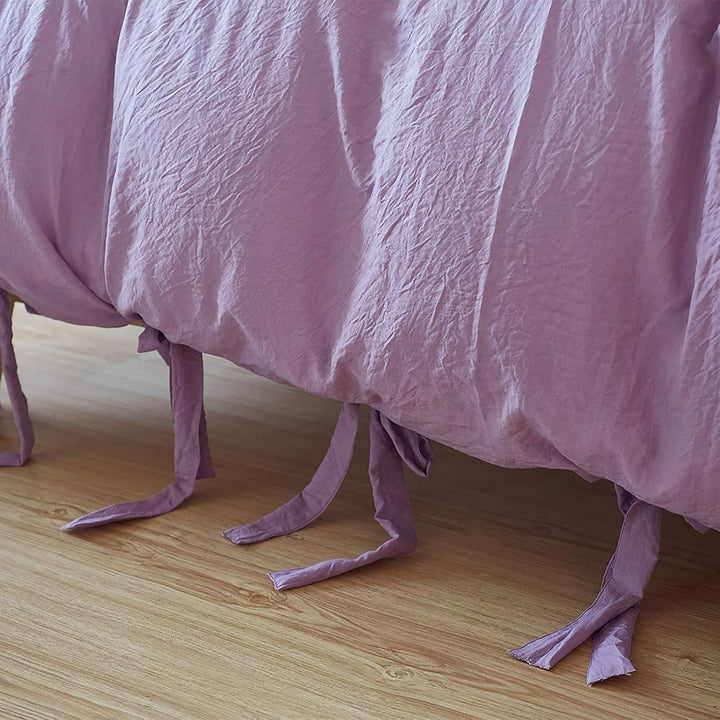 Close-up of the knot ends on the lilac duvet cover from the VibeCore Aesthetic Knot So Ordinary Duvet Cover Set, highlighting the chic knot detail that adds a modern, stylish flair to your bedding.