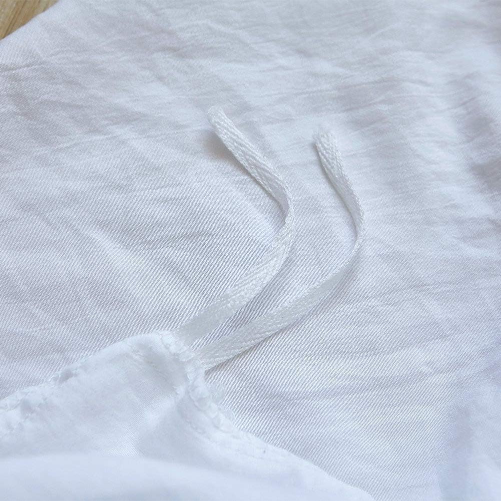 Close-up of the stylish tie feature on the white duvet cover from the VibeCore Aesthetic Knot So Ordinary Duvet Cover Set, showcasing the trendy design detail that adds a unique, fashionable touch to your bedding.
