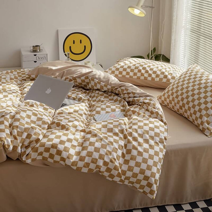 Close-up of the right side, demonstrating the checkered pattern on the 'VibeCore Mini Checkered Bedding Set' in Brown. The modern, sleek design of the mini checkers enhances the stylish, cozy feel of the bedding, perfect for adding a fresh, contemporary vibe to your space.