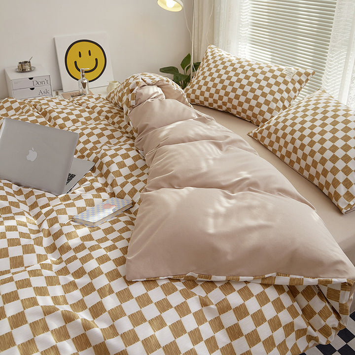 Close-up side view demonstrating the interior of the duvet cover and checkered pattern of the 'VibeCore Mini Checkered Bedding Set' in Brown. The soft, high-quality fabric features a modern, sleek mini checkered design, adding a bold, contemporary touch to the cozy bedding.
