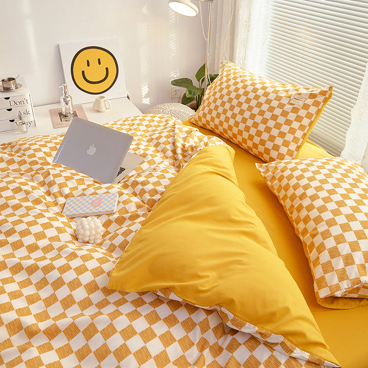 Close-up side view demonstrating the interior of the duvet cover and checkered pattern of the 'VibeCore Mini Checkered Bedding Set' in Mustard Yellow. The soft, high-quality fabric features a modern, sleek mini checkered design, adding a bold, contemporary touch to the cozy bedding.
