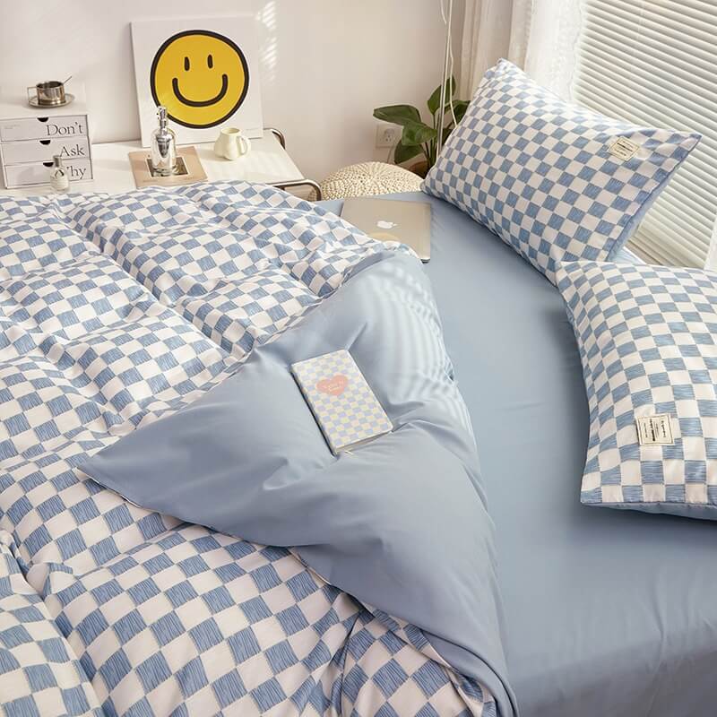 Alternate close-up side view of the 'VibeCore Aesthetic Mini Checkered Duvet Cover Set' in Sky Blue, highlighting the detailed checkered pattern and soft, high-quality fabric. The modern design adds a fresh, stylish touch to any bedroom or dorm, offering both comfort and contemporary flair.